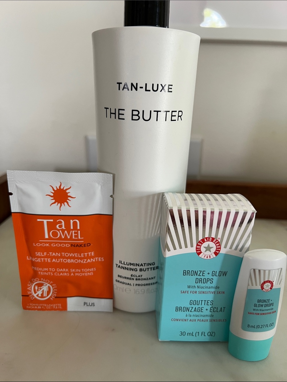 The Butter from Tan-Luxe Illuminating Tanning Butter with travel size products